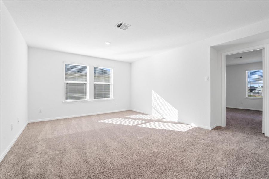 Head upstairs and enjoy the Loft—an additional living area perfect for a game room, media space, or a peaceful retreat.