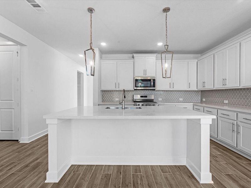 Furnished interior view inside a new home in Sienna, Missouri City (Image 4).