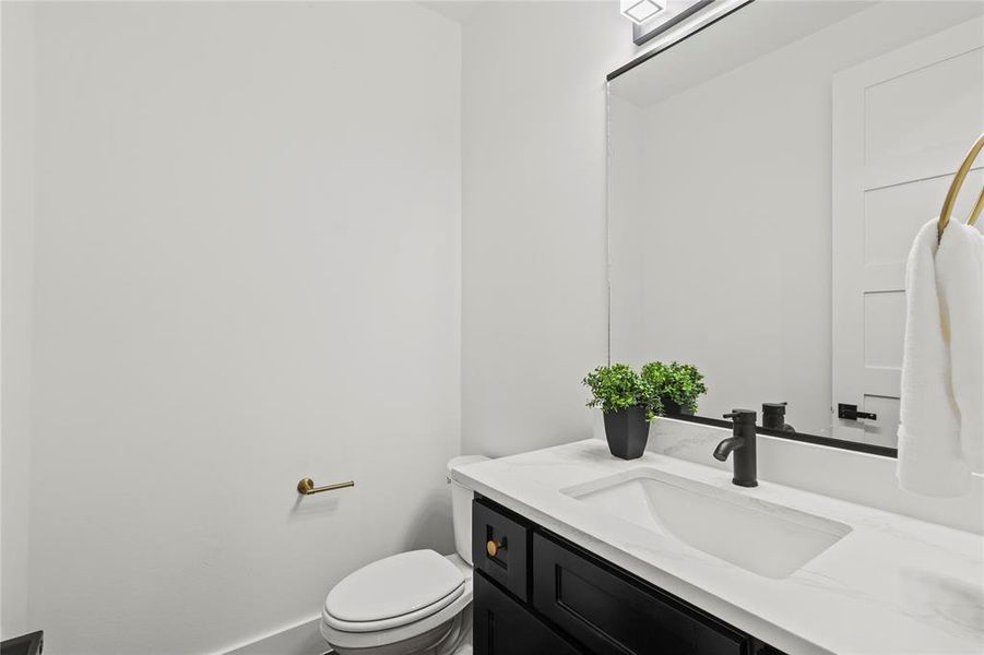 Bathroom with vanity and toilet