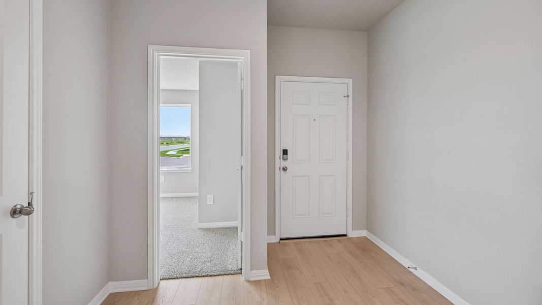 Spacious, unfurnished interior of a new home in Carillon, Manor (Image 12).