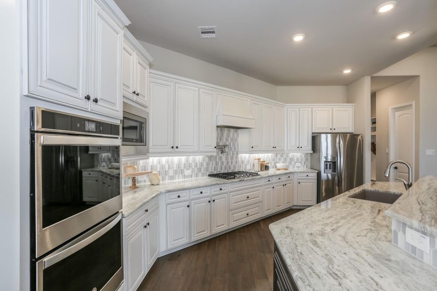 Furnished interior view inside a new home in Valencia: Hilltop Collection, Manvel (Image 22).