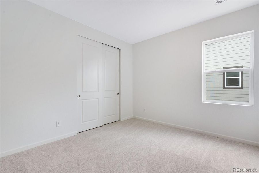 Spacious, unfurnished interior of a new home in Reunion, Commerce City (Image 45).