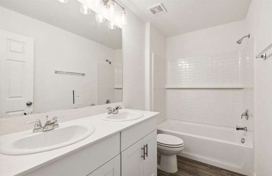 Upgraded secondary bathroom*real home pictured