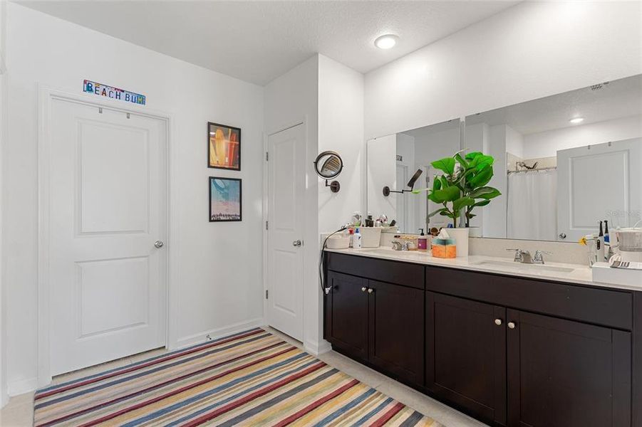 Furnished interior view inside a new home in Lawson Dunes: Estate Collection, Haines City (Image 7).