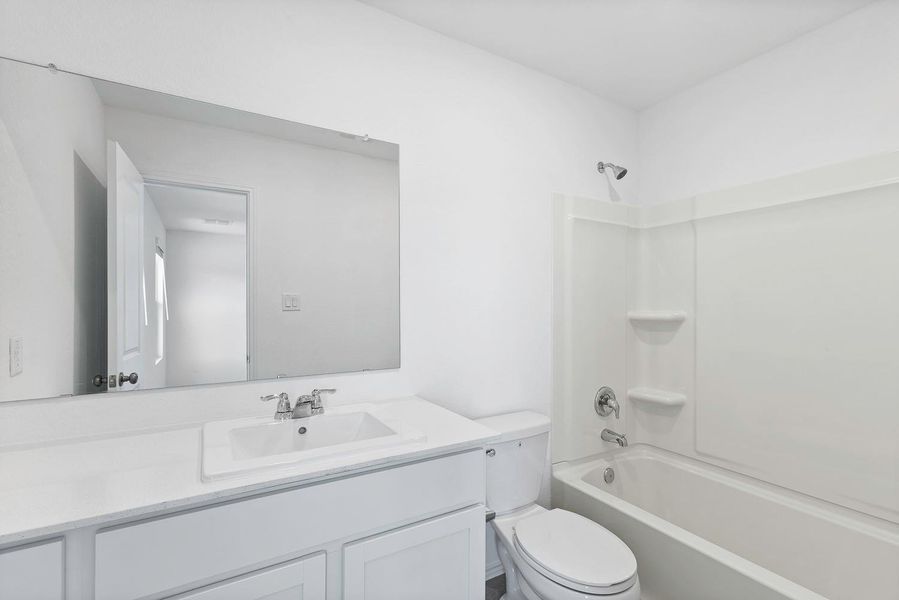 Furnished interior view inside a new home in Plum Creek North: Stonehill Collection, Kyle (Image 9).