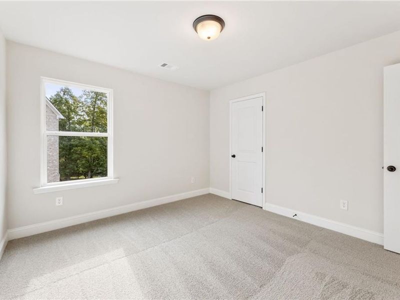 Spacious, unfurnished interior of a new home in Melody Lakeside Estates, Buford (Image 15).