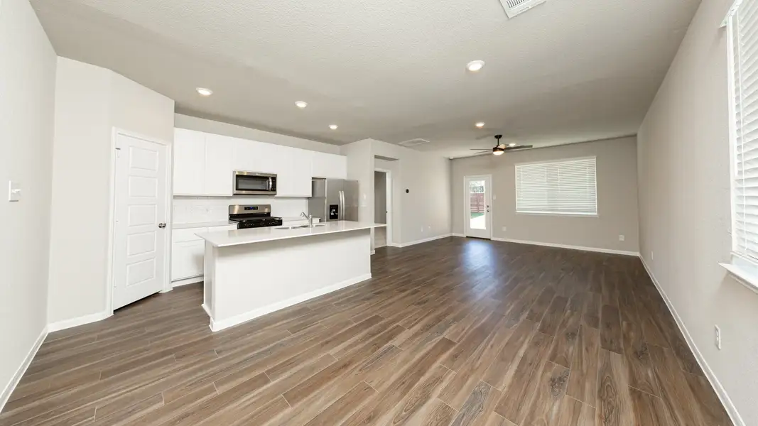 Kitchen to Dining Area and Family Room