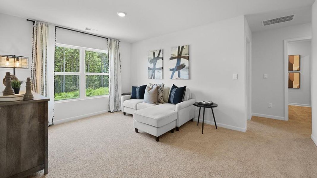 Furnished interior view inside a new home in Oaks at Cedar Grove, Fairburn (Image 15).