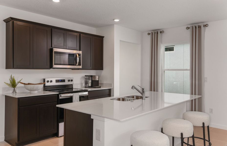 Furnished interior view inside a new home in Riversong, Parrish (Image 8).