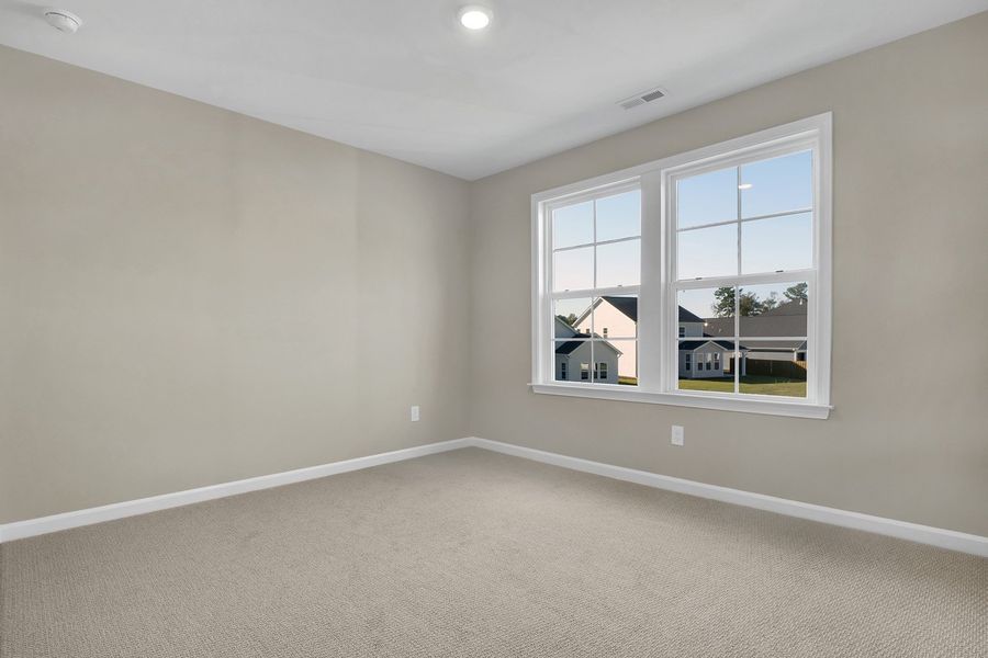 Spacious, unfurnished interior of a new home in Grand Park, Leland (Image 30).