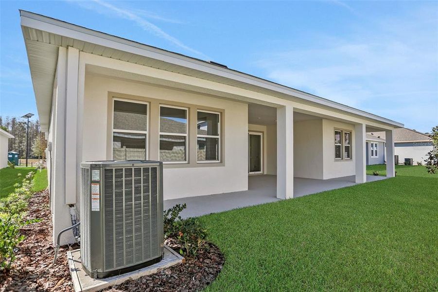Exterior details and patio area of a home in Angeline, Land O' Lakes (Image 3).