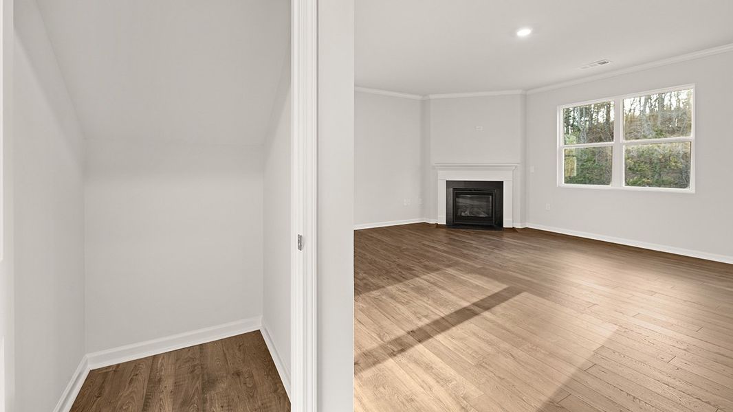 Representative unfurnished interior of a home built from the Mansfield by D.R. Horton in Liberty Crossing, Braselton (Image 17).