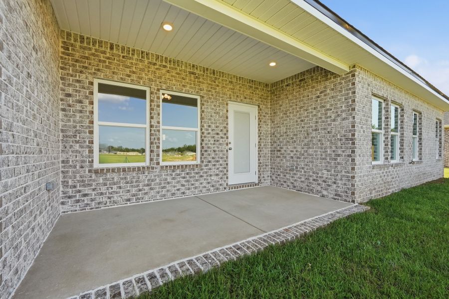 Exterior details and patio area of a home in Southern Charm, Crestview (Image 4). Exterior details and patio area of a home in Southern Charm, Crestview (Image 4).