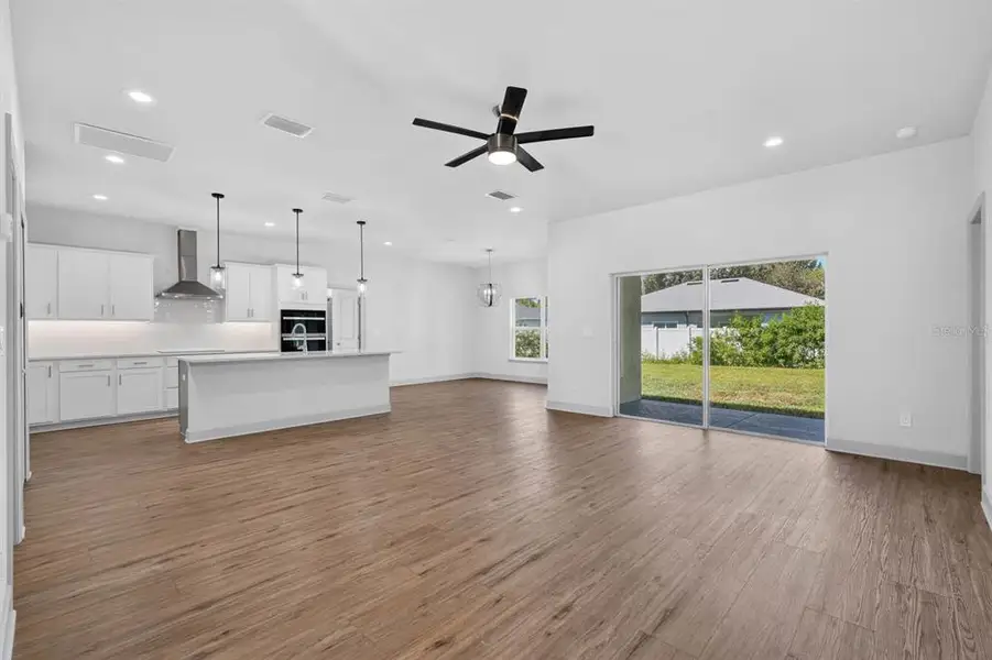Spacious, unfurnished interior of a new home in , New Smyrna Beach (Image 36).