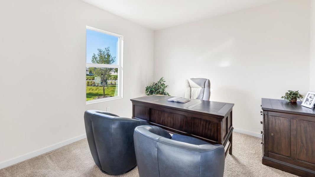 Representative furnished interior of a home built from the CARRINGTON by D.R. Horton in Sea Cove, Punta Gorda (Image 17).