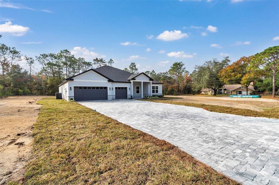 Front exterior of a new home in , Beverly Hills, FL, highlighting curb appeal (Image 1). Front exterior of a new home in , Beverly Hills, FL, highlighting curb appeal (Image 1).