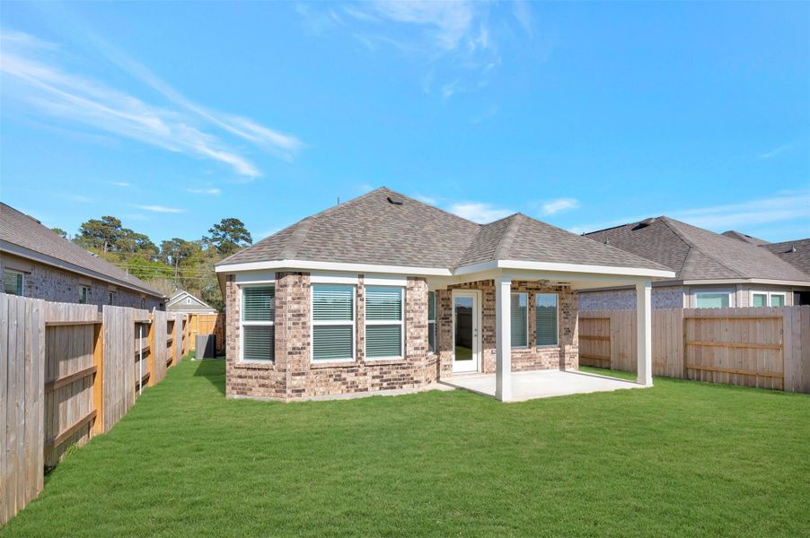 Exterior details and patio area of a home in Sorella, Tomball (Image 20).