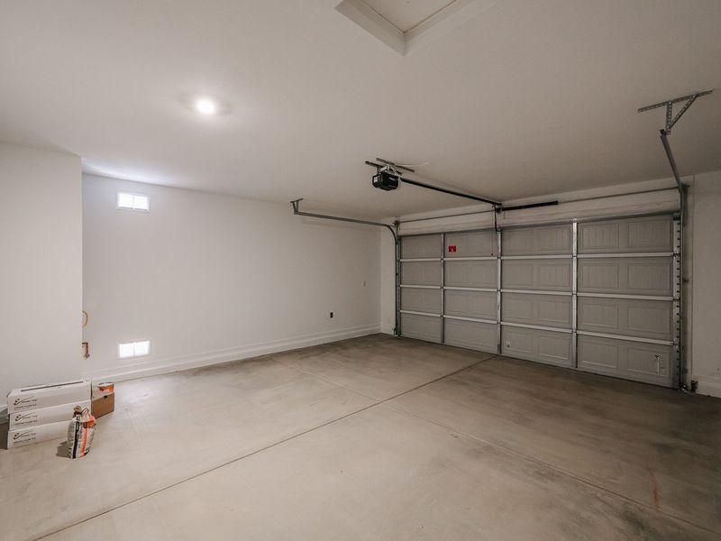 A room with a metal gate.