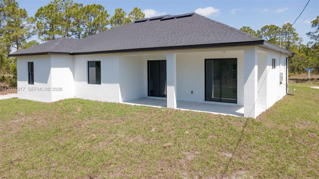 Exterior details and patio area of a home in , Lehigh Acres (Image 3).