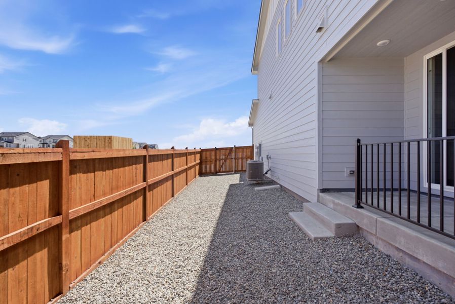 Exterior details and patio area of a home in Sky Ranch, Watkins (Image 22). Exterior details and patio area of a home in Sky Ranch, Watkins (Image 22).