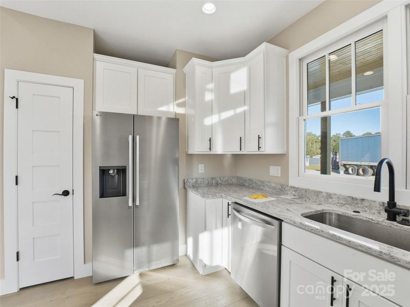 Furnished interior view inside a new home in , Hendersonville (Image 8).