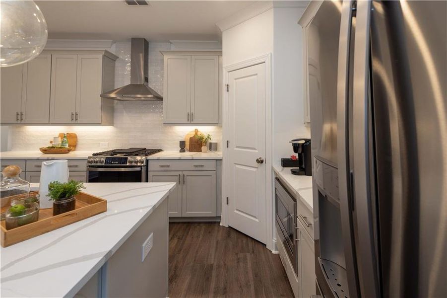 Furnished interior view inside a new home in Ward's Crossing Townhomes, Johns Creek (Image 10).
