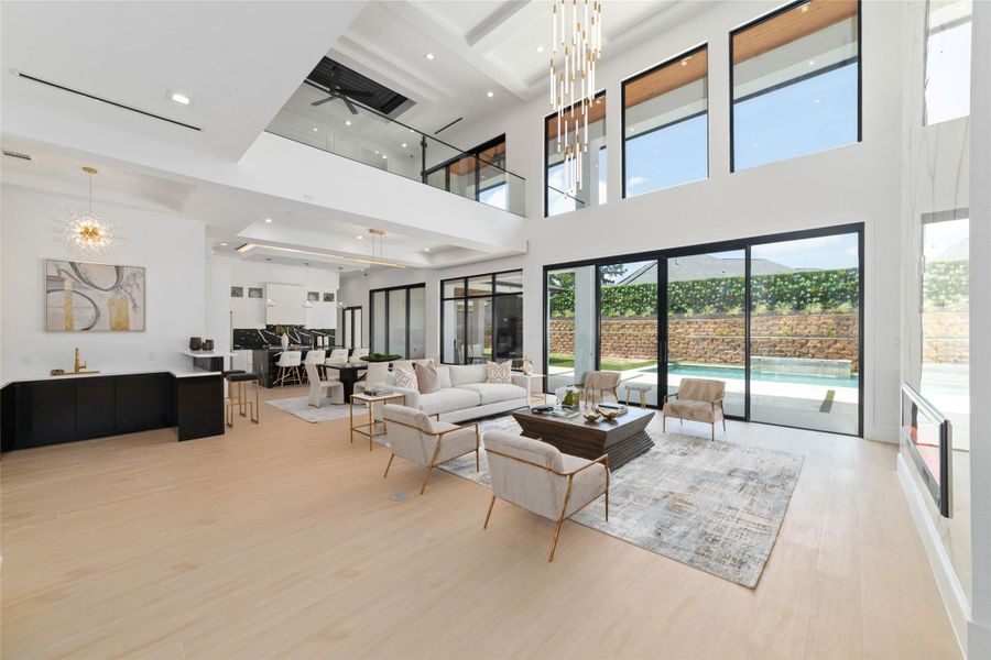 A grand foyer offers the first glimpse of the home's remarkable scale.