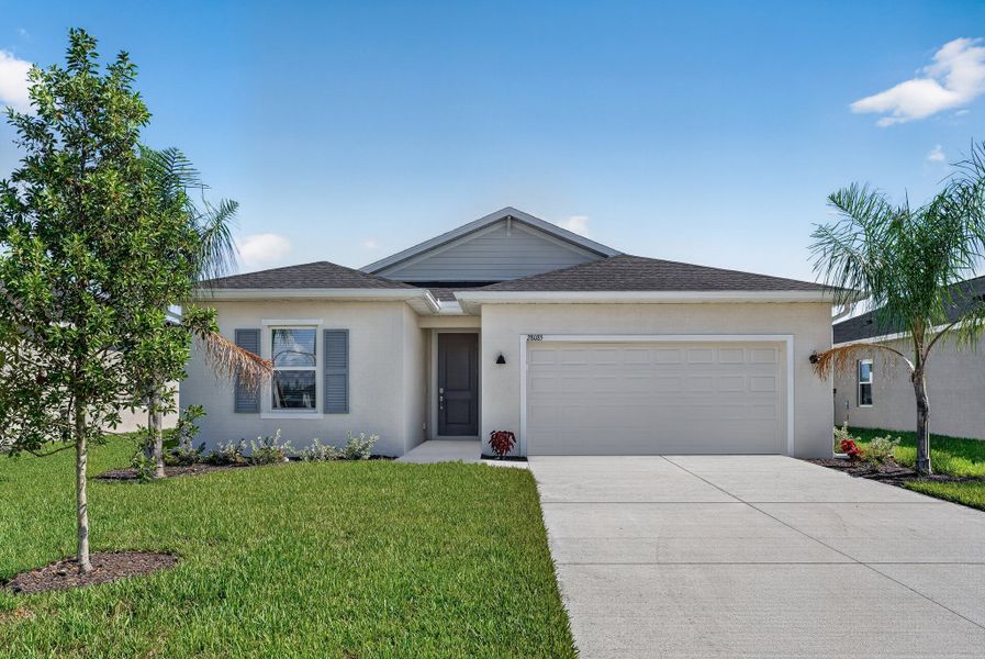 Front exterior of a new home in Willow, Punta Gorda, FL, highlighting curb appeal (Image 1). Front exterior of a new home in Willow, Punta Gorda, FL, highlighting curb appeal (Image 1).