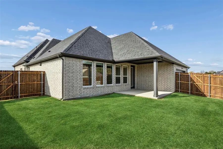 Exterior details and patio area of a home in Ten Mile Creek Estates, DeSoto (Image 3).