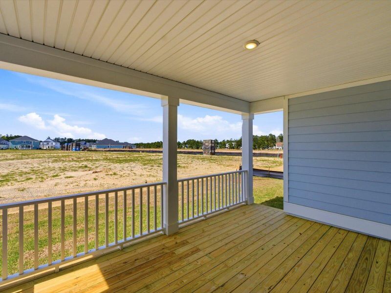 Exterior details and patio area of a home in The Coves at Lakes of Cane Bay II, Summerville (Image 2). Exterior details and patio area of a home in The Coves at Lakes of Cane Bay II, Summerville (Image 2).