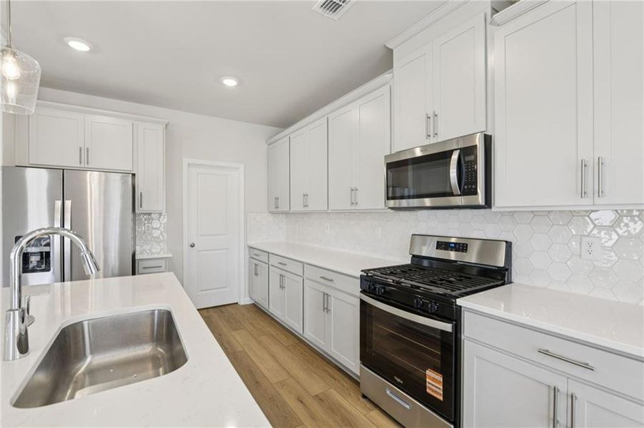 Furnished interior view inside a new home in Harmony Manor, Fairburn (Image 13).