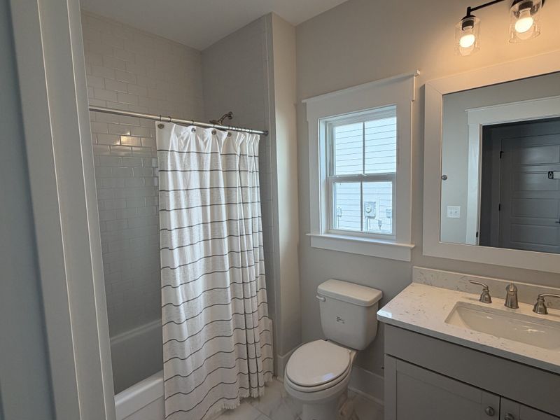Furnished interior view inside a new home in The Sanctuary at Sunset Beach, Sunset Beach (Image 10).