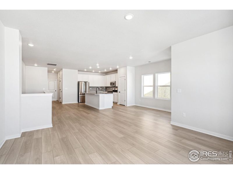 Spacious, unfurnished interior of a new home in Kinston Mainstreet Townhomes, Loveland (Image 24).