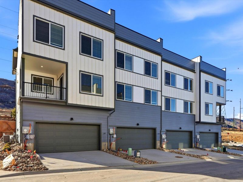 Front exterior of a new home in Three Hills, Morrison, CO, highlighting curb appeal (Image 2). Front exterior of a new home in Three Hills, Morrison, CO, highlighting curb appeal (Image 2).