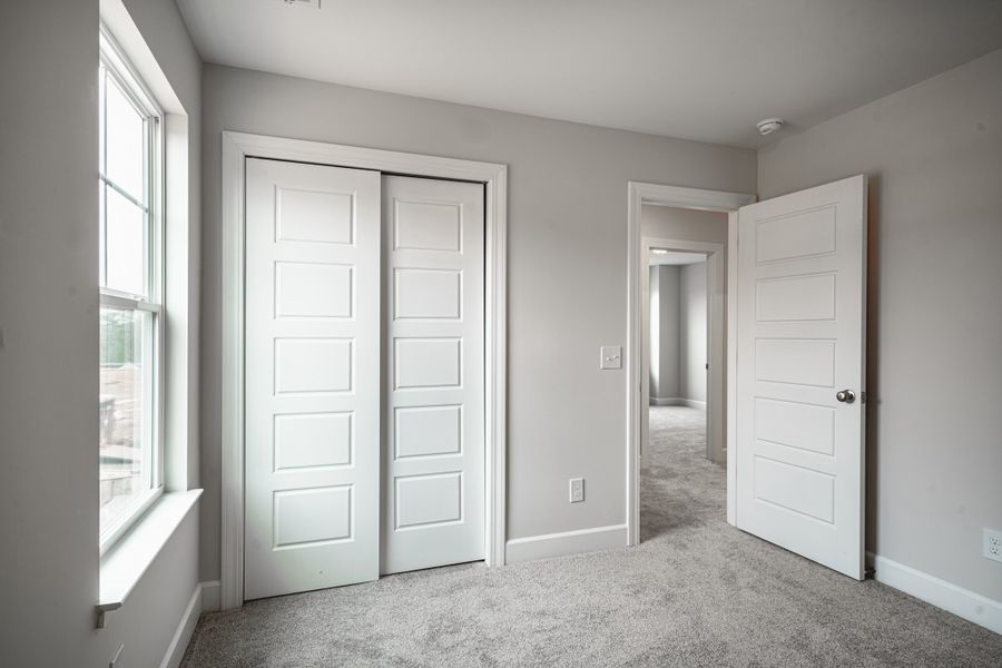 Representative unfurnished interior of a home built from the The McKee Manor by Cothran Homes in Holly Ridge, Greenville (Image 36). Representative unfurnished interior of a home built from the The McKee Manor by Cothran Homes in Holly Ridge, Greenville (Image 36).