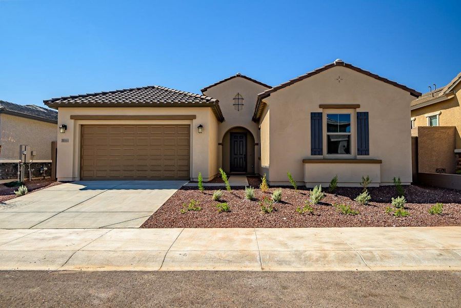 Front exterior of a new home in Black Rock at Verrado, Buckeye, AZ, highlighting curb appeal (Image 6).