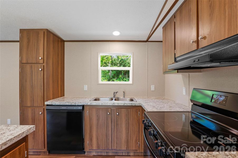 Furnished interior view inside a new home in , Candler (Image 3).