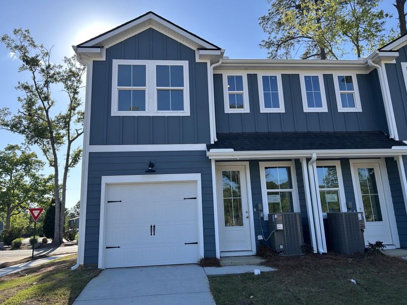 Front exterior of a new home in , Summerville, SC, highlighting curb appeal (Image 23).