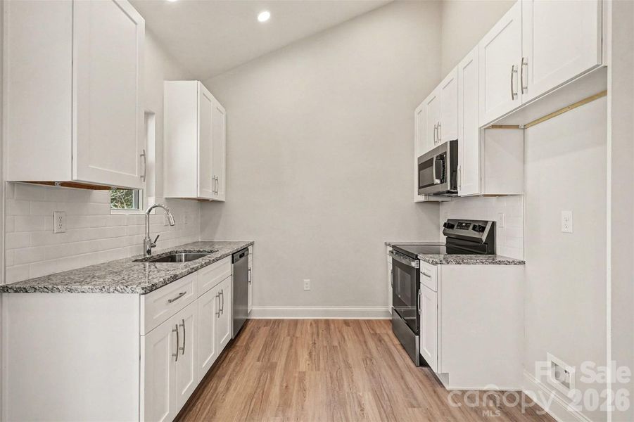 Furnished interior view inside a new home in , Monroe (Image 3).