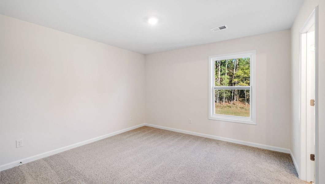 Representative unfurnished interior of a home built from the LONDON by D.R. Horton in Adams Glen, Greenville (Image 32).
