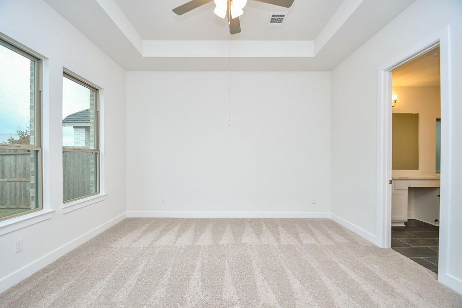 A flexible open-concept room perfect for a family room, office, or play area.