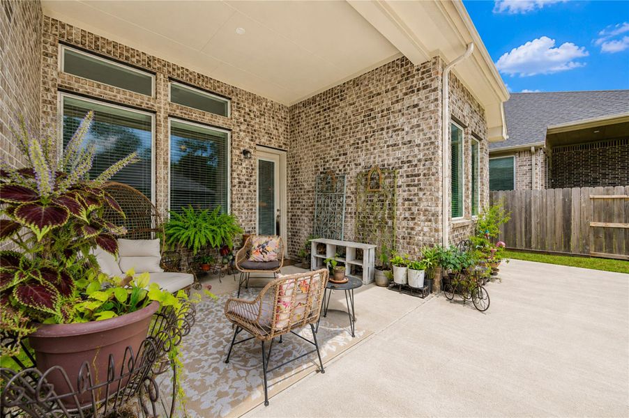 Enjoy peaceful mornings and evening gatherings in this inviting outdoor living area. Enjoy peaceful mornings and evening gatherings in this inviting outdoor living area.
