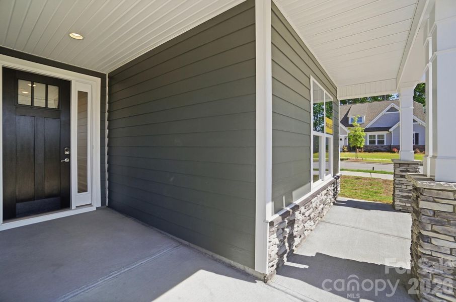 Exterior details and patio area of a home in Heritage - 55+ Community, Indian Trail (Image 2).