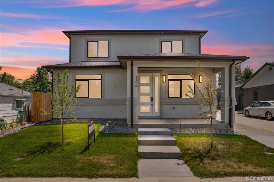 Front exterior of a new home in , Denver, CO, highlighting curb appeal (Image 2).