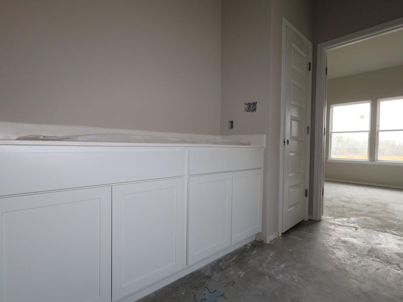 In-progress construction of a new home in Carillon, Manor, TX (Image 22).