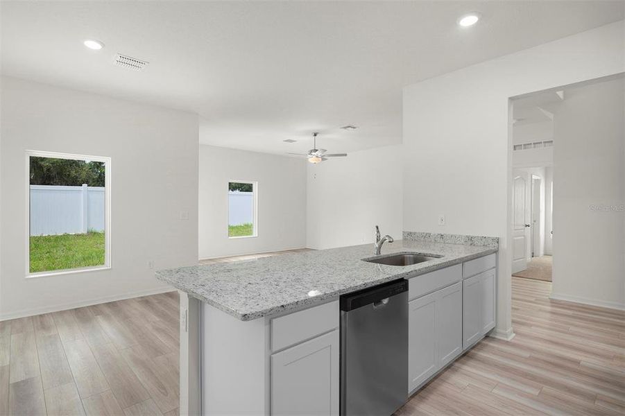 Furnished interior view inside a new home in Tula Parc, Astatula (Image 7).