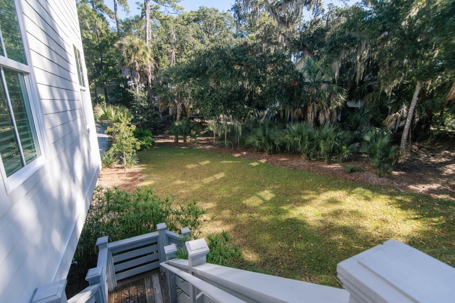Exterior details and patio area of a home in , Edisto Island (Image 28).