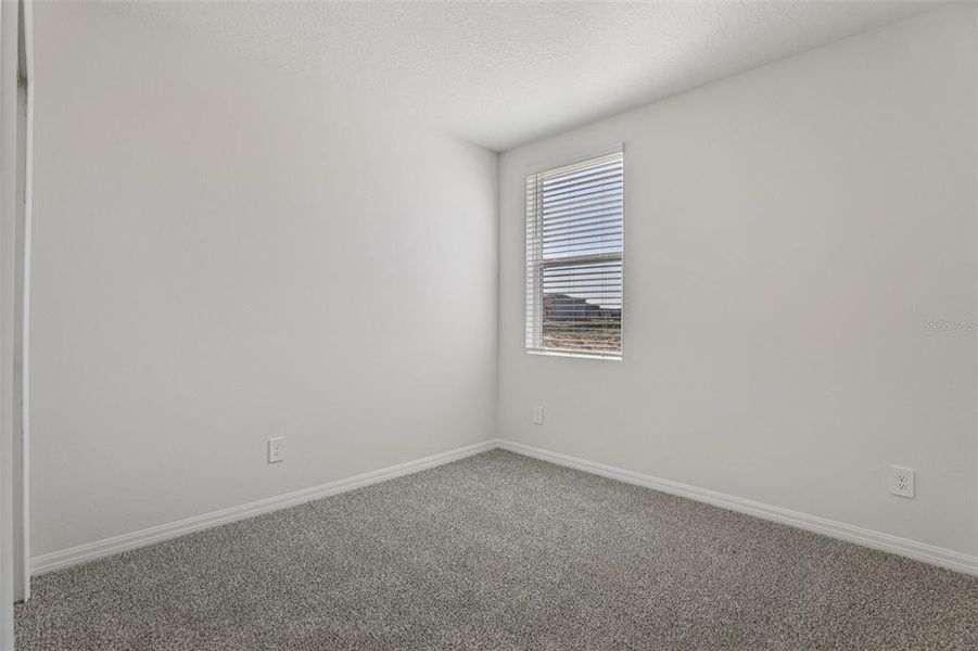 Spacious, unfurnished interior of a new home in Crosswinds - Signature Series, Haines City (Image 18).