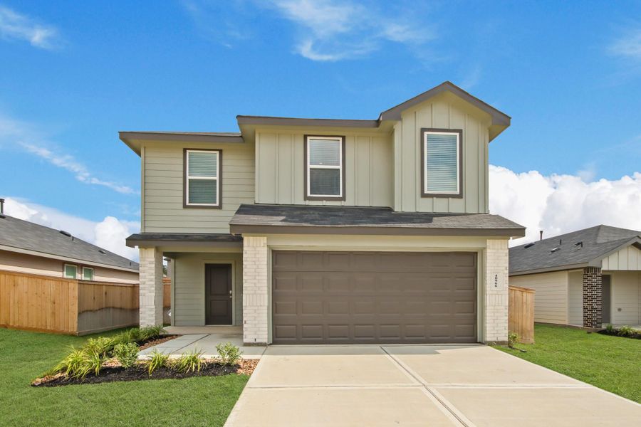 Front exterior of a new home in Mill Creek, Magnolia, TX, highlighting curb appeal (Image 16). Front exterior of a new home in Mill Creek, Magnolia, TX, highlighting curb appeal (Image 16).