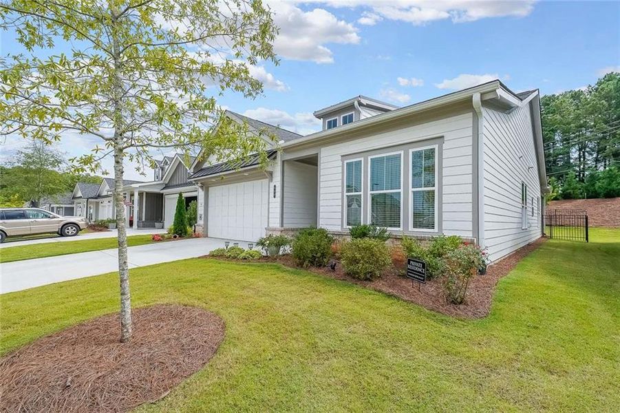 Exterior details and patio area of a home in The Reserve at Bells Ferry, Kennesaw (Image 22).